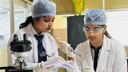 KCMT biotechnology students performing lab experiments