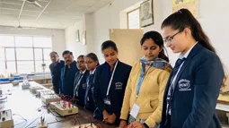 KCMT students performing practical experiments in lab